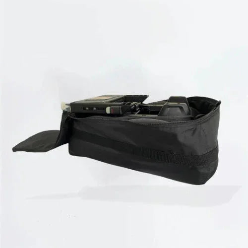 Product picture of a TinySeats Shoulder Bag. The bag is open and inside there is a TinySeats Two car seat.